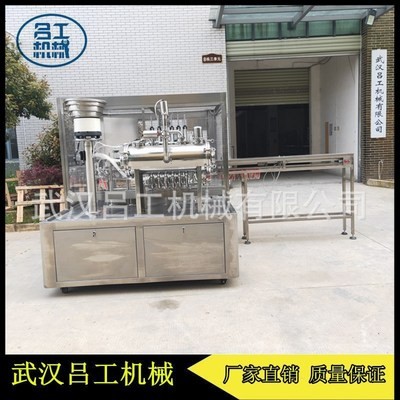 灌裝旋蓋機(jī)吸嘴袋葡萄汁全自動(dòng)灌裝旋蓋一體機(jī)設(shè)備